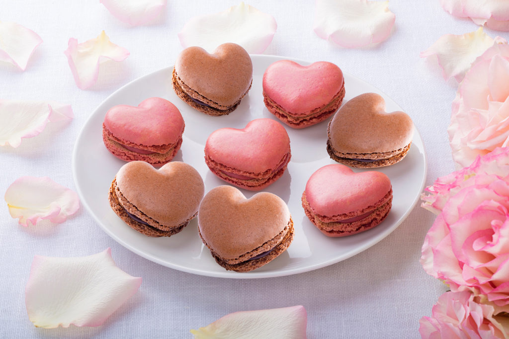 This image has an empty alt attribute; its file name is Tipiak-Heart-Shaped-Macarons-on-plate-1024x683.jpg